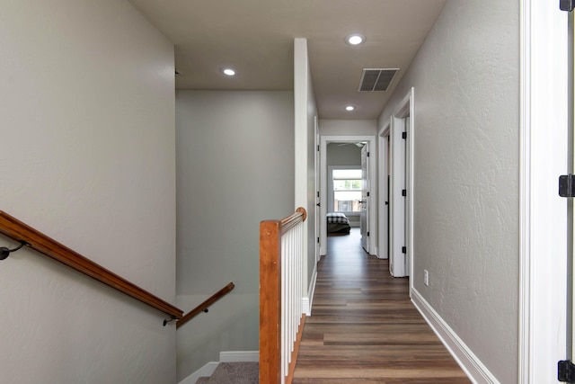 700 E Delmar St, Springfield, MO 65807 - hallway featuring recessed lighting, wood finished floors, an upstairs landing, baseboards, and a textured wall
