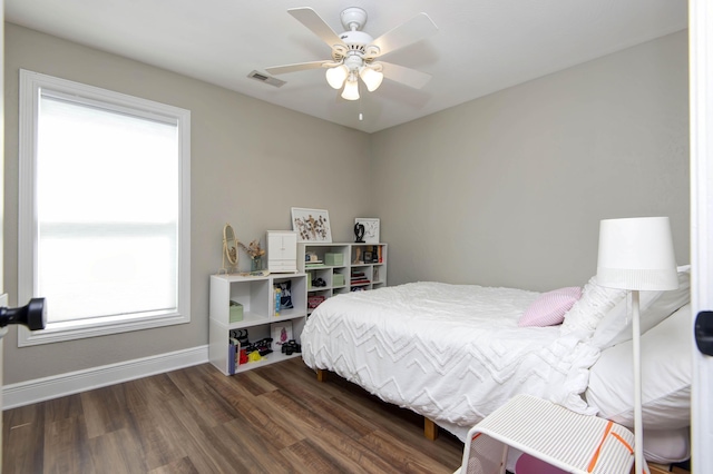 700 E Delmar St, Springfield, MO 65807 - bedroom featuring wood finished floors, baseboards, and a ceiling fan