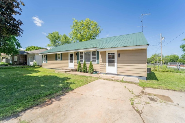 view of front of house featuring metal roof