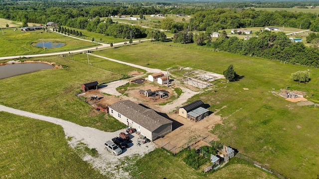 aerial view of property's location featuring a nearby body of water