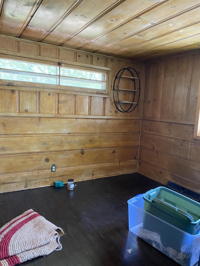 1835 S Franklin Ave, Springfield, MO 65807 - unfurnished bedroom with wooden ceiling, hardwood / wood-style floors, and wooden walls