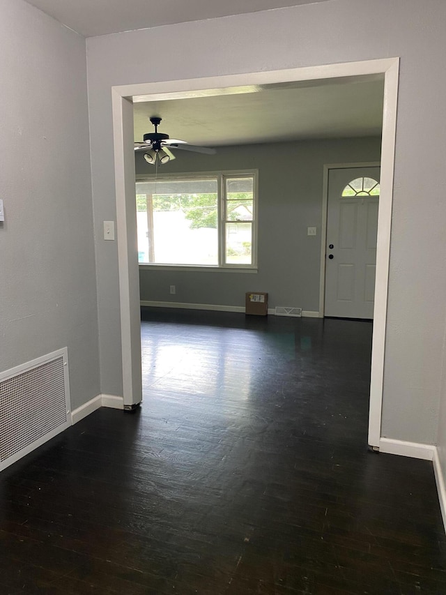 1835 S Franklin Ave, Springfield, MO 65807 - unfurnished room with dark wood-style floors and ceiling fan