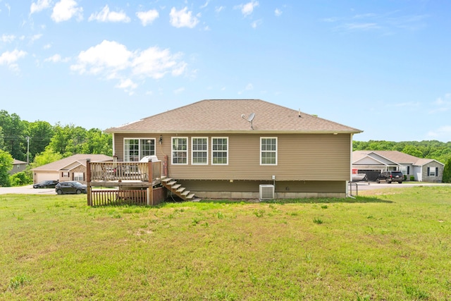 19662 Ladera Rd, Waynesville, MO 65583 - rear view of property with a wooden deck, a yard, and central AC unit