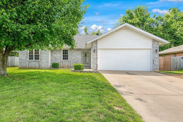 439 S Suburban Ave, Springfield, MO 65802 - ranch-style home with driveway, an attached garage, and brick siding