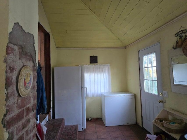3590 County Road 7140, West Plains, MO 65775 - laundry area with wood ceiling, tile patterned floors, and crown molding