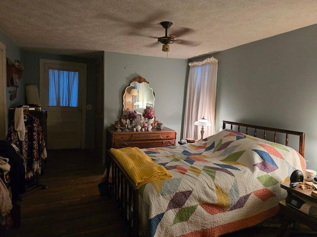 3590 County Road 7140, West Plains, MO 65775 - bedroom featuring wood finished floors, a textured ceiling, and ceiling fan