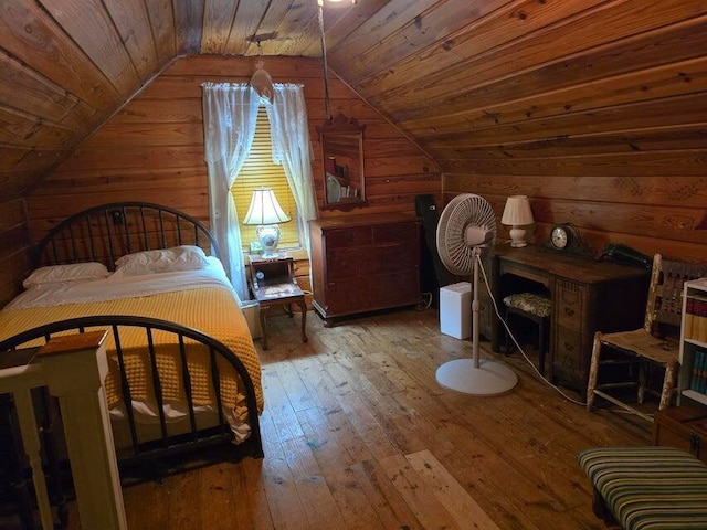 3590 County Road 7140, West Plains, MO 65775 - bedroom with wood walls, vaulted ceiling, hardwood / wood-style flooring, and wood ceiling