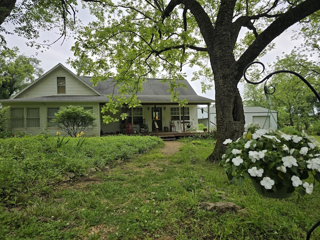 3590 County Road 7140, West Plains, MO 65775 - rear view of house featuring a porch and a garage
