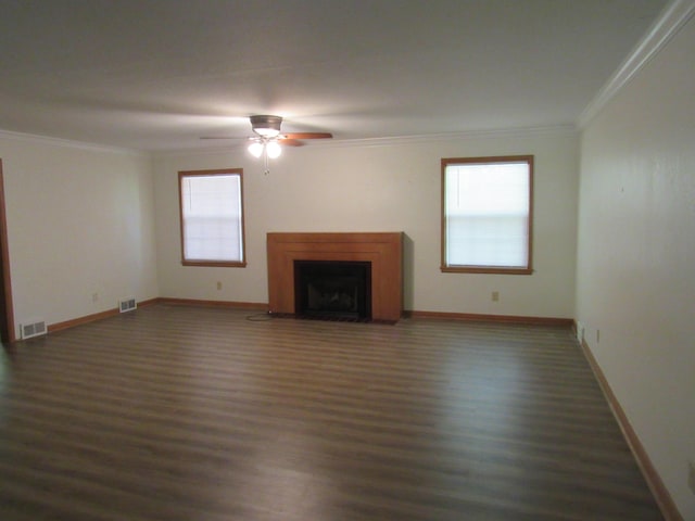 2124 S Kimbrough Ave, Springfield, MO 65807 - unfurnished living room featuring wood finished floors, crown molding, ceiling fan, baseboards, and a fireplace with flush hearth