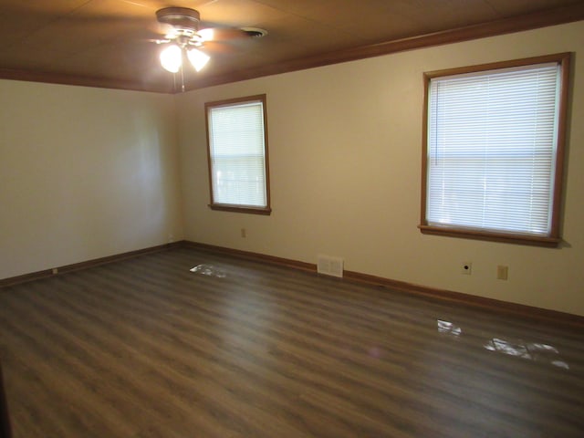 2124 S Kimbrough Ave, Springfield, MO 65807 - unfurnished room featuring dark wood finished floors, ceiling fan, and baseboards