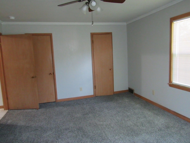 2124 S Kimbrough Ave, Springfield, MO 65807 - unfurnished bedroom featuring light carpet, baseboards, crown molding, and ceiling fan