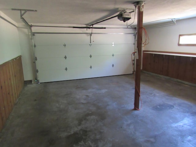 2124 S Kimbrough Ave, Springfield, MO 65807 - garage featuring a garage door opener