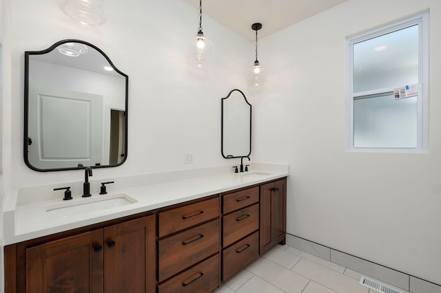 1698 N Marlowe Ave, Springfield, MO 65802 - bathroom with double vanity and tile patterned floors