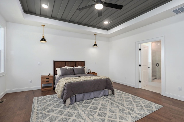 1698 N Marlowe Ave, Springfield, MO 65802 - bedroom featuring a tray ceiling, baseboards, wood finished floors, and recessed lighting