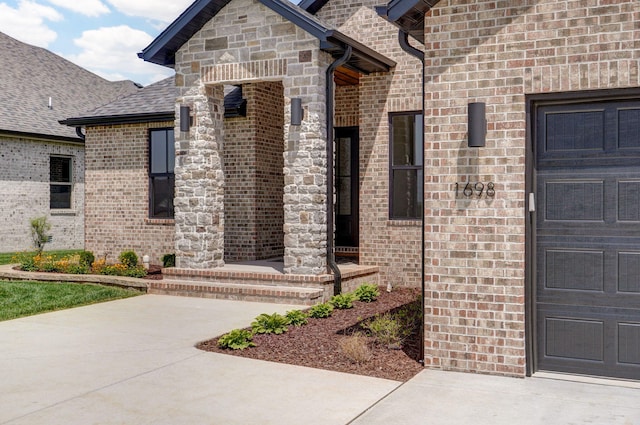 1698 N Marlowe Ave, Springfield, MO 65802 - property entrance with brick siding and a shingled roof