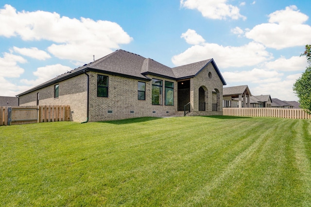1698 N Marlowe Ave, Springfield, MO 65802 - rear view of property featuring brick siding and roof with shingles