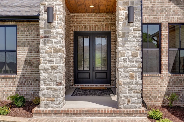 1698 N Marlowe Ave, Springfield, MO 65802 - entrance to property with french doors and brick siding
