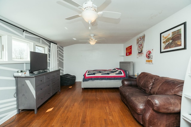 5724 E Mill St, Springfield, MO 65802 - bedroom featuring wood finished floors, vaulted ceiling, and a ceiling fan