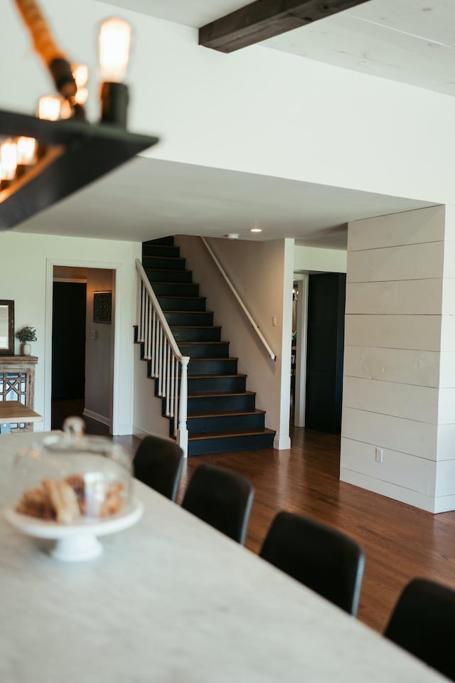 5724 E Mill St, Springfield, MO 65802 - dining space with stairway, wood finished floors, and beam ceiling