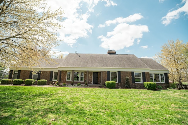 5724 E Mill St, Springfield, MO 65802 - view of front of property featuring brick siding, a chimney, and a shingled roof