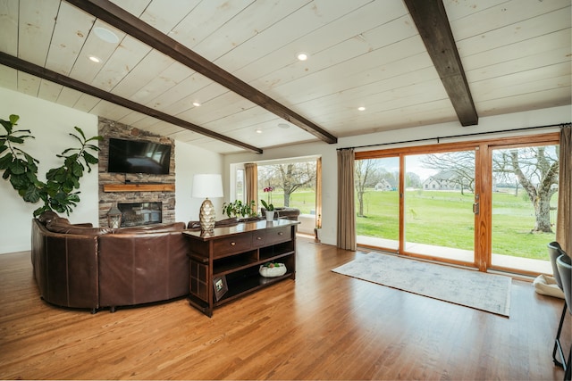 5724 E Mill St, Springfield, MO 65802 - living area with wood ceiling, a stone fireplace, light wood-style floors, and recessed lighting