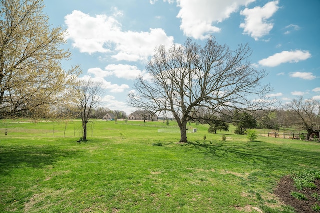 5724 E Mill St, Springfield, MO 65802 - view of green lawn featuring a rural view