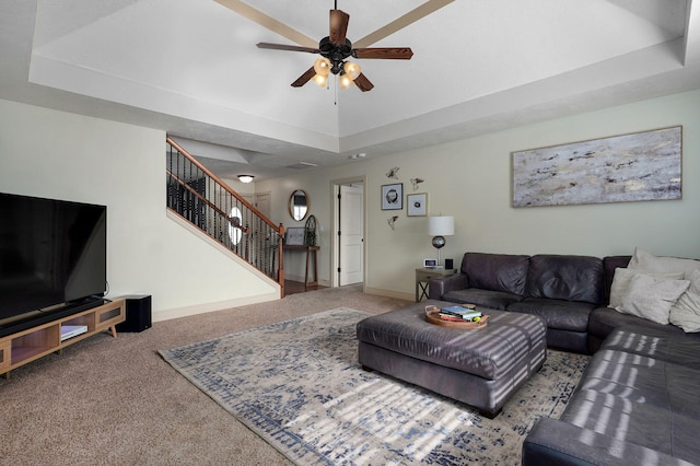 1428 S Appomattox Ave, Republic, MO 65738 - carpeted living room featuring stairs, a ceiling fan, baseboards, and a tray ceiling