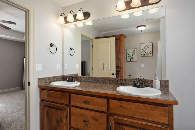 1428 S Appomattox Ave, Republic, MO 65738 - bathroom featuring ceiling fan and double vanity