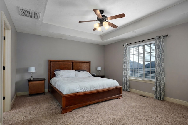 1428 S Appomattox Ave, Republic, MO 65738 - bedroom with carpet, baseboards, a tray ceiling, and a ceiling fan