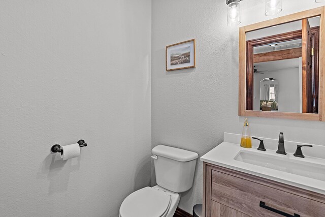 16326 Lawrence Unit 1232, Marionville, MO 65705 - half bath with toilet, vanity, and a textured wall