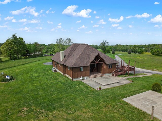 16326 Lawrence Unit 1232, Marionville, MO 65705 - back of house with a yard, a wooden deck, a patio area, and a shingled roof