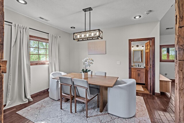 16326 Lawrence Unit 1232, Marionville, MO 65705 - dining room featuring dark wood-style flooring, a textured ceiling, and recessed lighting