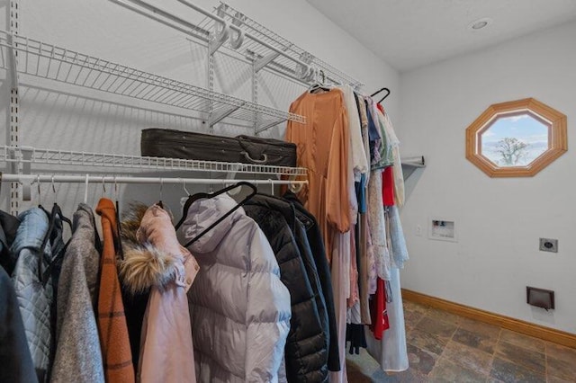 16326 Lawrence Unit 1232, Marionville, MO 65705 - walk in closet featuring stone finish floors