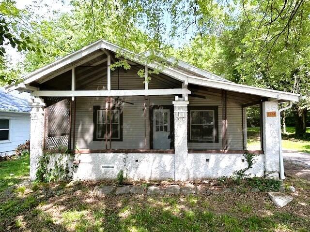2238 N Rogers Ave, Springfield, MO 65803 - view of front of home featuring crawl space and covered porch