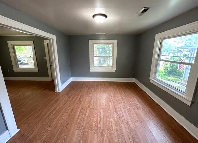 2238 N Rogers Ave, Springfield, MO 65803 - unfurnished room featuring wood finished floors and baseboards
