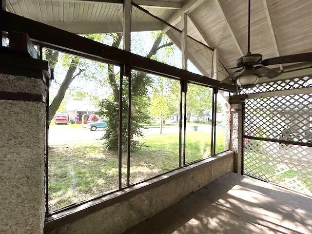 2238 N Rogers Ave, Springfield, MO 65803 - unfurnished sunroom featuring a ceiling fan, lofted ceiling, and healthy amount of natural light