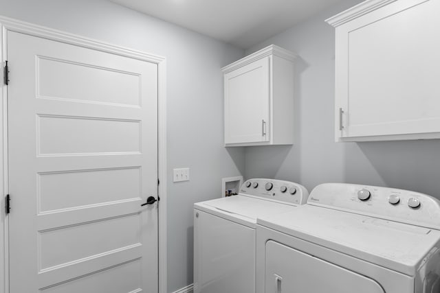 5404 S Clifton Ave, Springfield, MO 65810 - laundry area featuring washing machine and clothes dryer and cabinet space