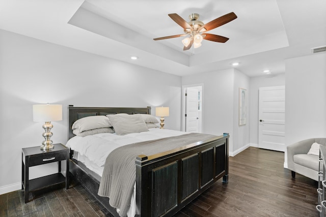 5404 S Clifton Ave, Springfield, MO 65810 - bedroom featuring a raised ceiling, baseboards, dark wood-style floors, and recessed lighting