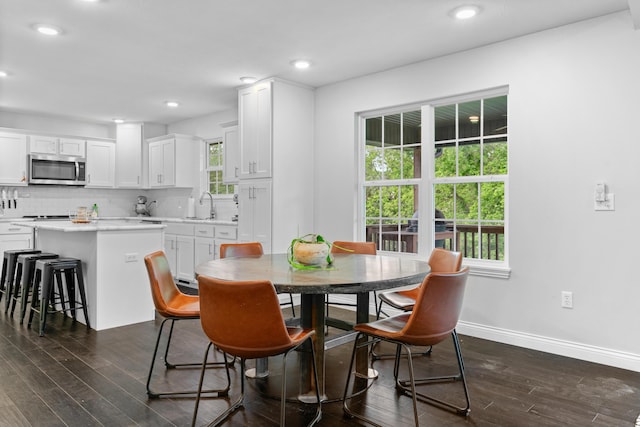5404 S Clifton Ave, Springfield, MO 65810 - dining space with dark wood-style flooring, baseboards, and recessed lighting