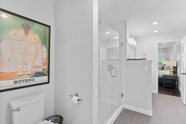 5404 S Clifton Ave, Springfield, MO 65810 - ensuite bathroom with a stall shower, toilet, recessed lighting, baseboards, and tile patterned flooring