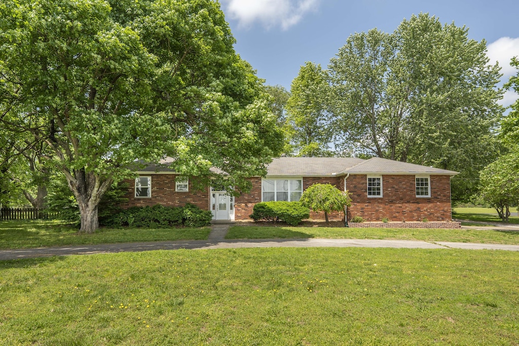 view of front of house with brick siding