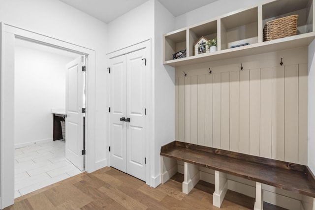 4531 E Hidden Oak St, Springfield, MO 65802 - mudroom with wood finished floors and baseboards