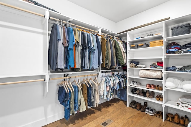 4531 E Hidden Oak St, Springfield, MO 65802 - walk in closet featuring wood finished floors