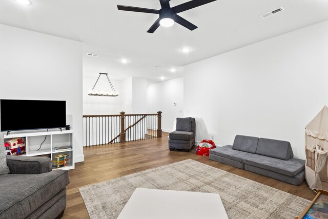 4531 E Hidden Oak St, Springfield, MO 65802 - living area with ceiling fan, wood finished floors, and recessed lighting