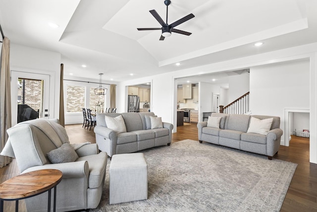 4531 E Hidden Oak St, Springfield, MO 65802 - living area with a ceiling fan, recessed lighting, dark wood-type flooring, a raised ceiling, and vaulted ceiling