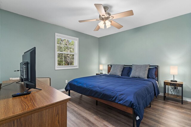 17 Montague Ln, Kimberling City, MO 65686 - bedroom featuring wood finished floors, baseboards, and a ceiling fan