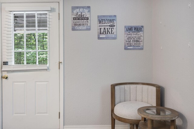 17 Montague Ln, Kimberling City, MO 65686 - doorway to outside featuring baseboards