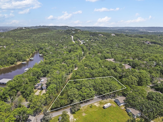 17 Montague Ln, Kimberling City, MO 65686 - aerial view of property's location with a nearby body of water, a heavily wooded area, and property boundaries highlighted