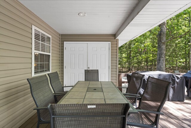 17 Montague Ln, Kimberling City, MO 65686 - wooden deck with outdoor dining area