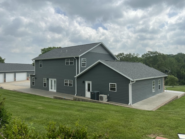 1995 Corder Pass Rd, Mansfield, MO 65704 - back of house with a patio, a shingled roof, a yard, and a cooling unit